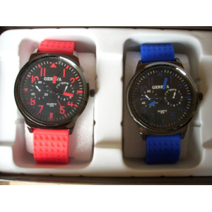 Horloge 2 stuks met rood en blauw rubber polsband nieuw, batterij is nog verzegeld