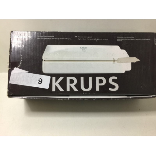 Snijmachine, merk Krups, kleur wit.
