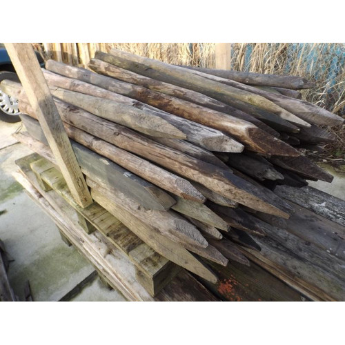 partij houten palen