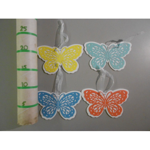 25 sets van 4 houten vlinders
