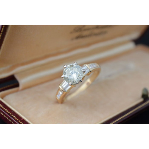 Gouden ring met briljant, baguette en prinses geslepen diamanten 